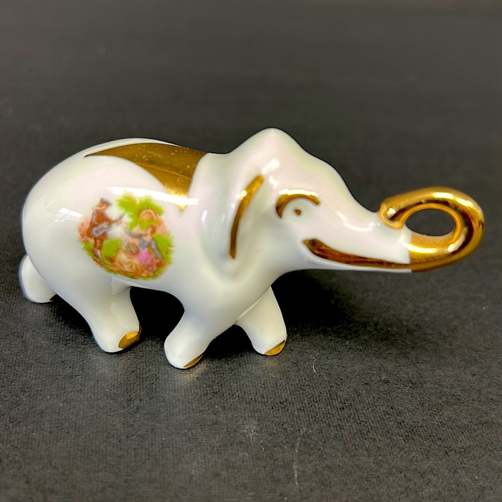 Vintage “Limoges France” hand decorated porcelain miniature elephant figurine